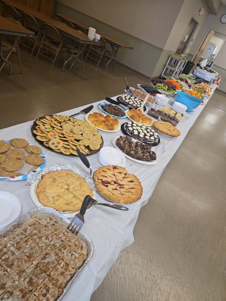 Dessert table with pies, cookies, and sweets by 419 Venue Guy