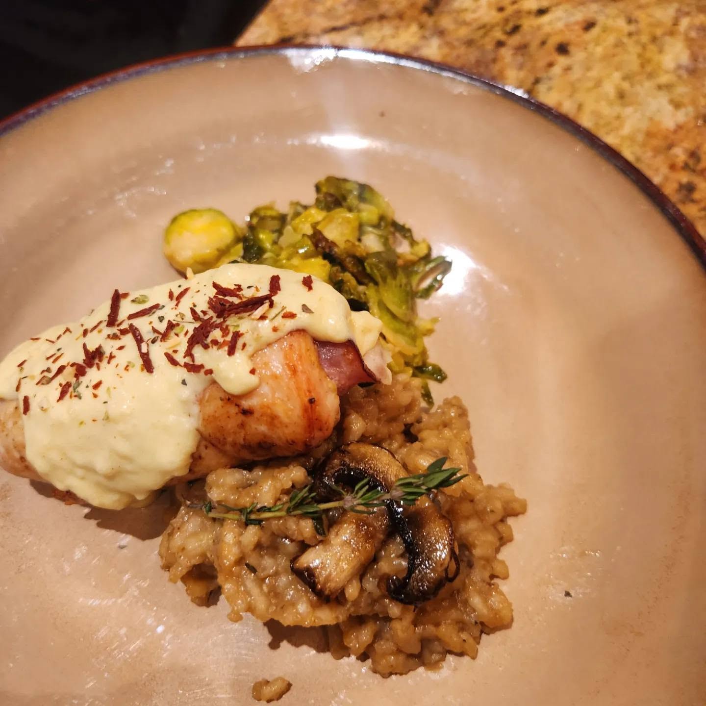 Gourmet plated entrée with risotto and Brussels sprouts