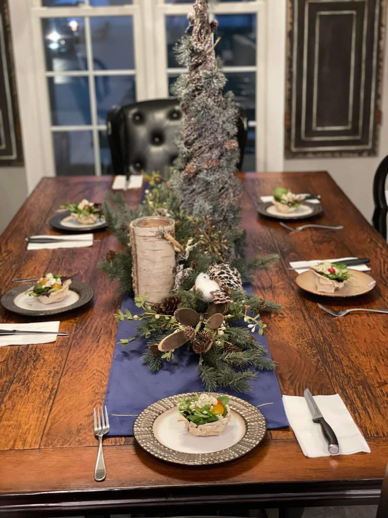Elegantly set dining table for an in-home chef dinner by 419 Venue Guy
