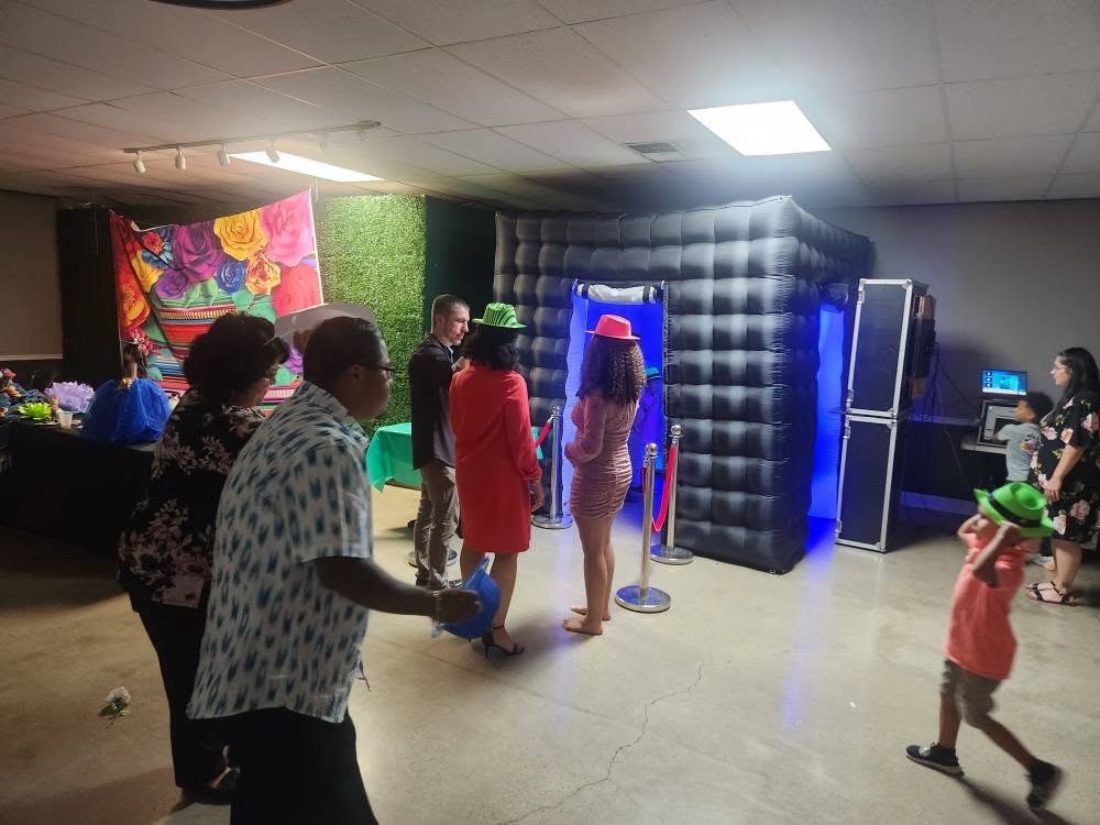 Guests lining up at the 419 Venue Guy inflatable photobooth at an event